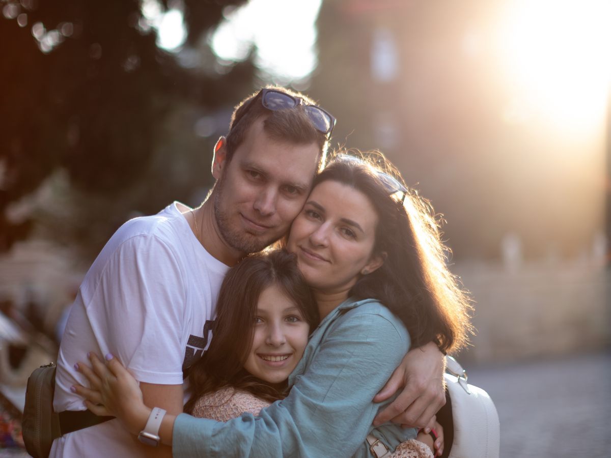A family sharing a warm, hopeful moment together
